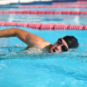 Radiotherapy for brain tumour - swimmer athlete doing crawl stroke