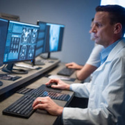 radiotherapy centre - radiologist looking at the MRI image