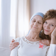 radiotherapy centre - daughter supporting her sick mother
