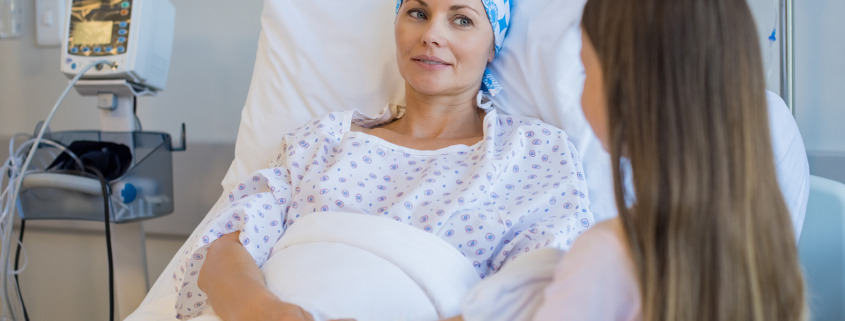 private chemotherapy treatment - Woman receiving cancer chemotherapy